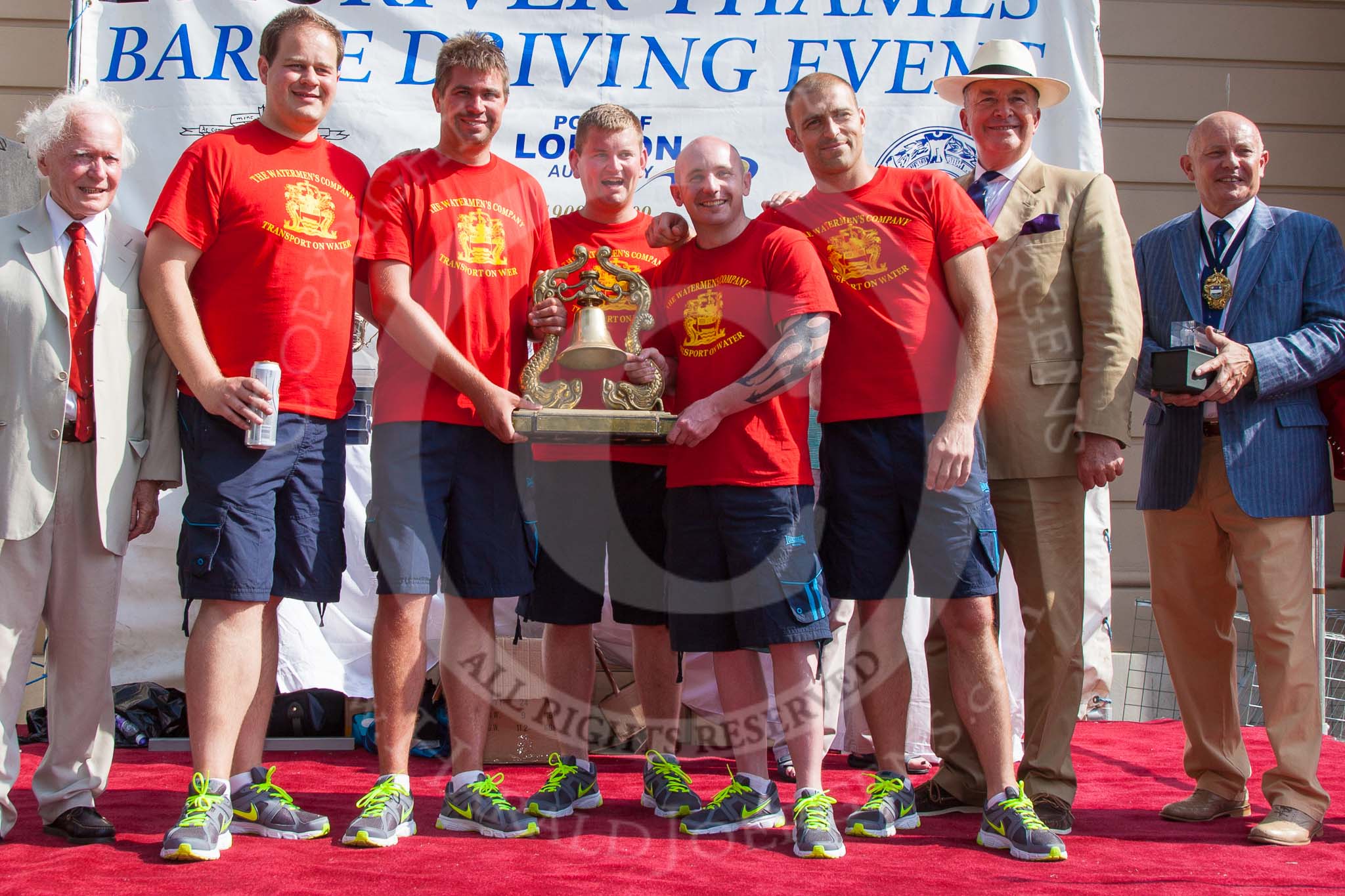 TOW River Thames Barge Driving Race 2013: The "Transport on Water Challenge Trophy", for the first overall winner, goes to the crew of barge "Blackwall", by the Port of London Authority..
River Thames between Greenwich and Westminster,
London,

United Kingdom,
on 13 July 2013 at 16:29, image #583