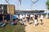 TOW River Thames Barge Driving Race 2013: Barge crews during a saftey briefing before the race, in front of the presentation stage at Greenwich College Gardens. In the background the "Cutty Sark"..
River Thames between Greenwich and Westminster,
London,

United Kingdom,
on 13 July 2013 at 10:13, image #18