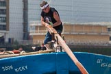 TOW River Thames Barge Driving Race 2013: The steerer on board of barge "Darren Lacey", by Princess Pocahontas, getting ready for the race..
River Thames between Greenwich and Westminster,
London,

United Kingdom,
on 13 July 2013 at 12:23, image #78