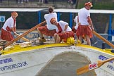 TOW River Thames Barge Driving Race 2013: The crew of barge "Hoppy", by GPS Fabrication, is starting to row from the start..
River Thames between Greenwich and Westminster,
London,

United Kingdom,
on 13 July 2013 at 12:35, image #111