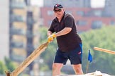 TOW River Thames Barge Driving Race 2013: The steerer on board of barge "Steve Faldo" by Capital Pleasure Boats..
River Thames between Greenwich and Westminster,
London,

United Kingdom,
on 13 July 2013 at 13:01, image #259
