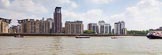 TOW River Thames Barge Driving Race 2013: Barge "Blackwall", by the Port of London Authority, in front of builings at the Thames Path. On the very right the flotilla of pleasure boats following the race leader "Blackwall"..
River Thames between Greenwich and Westminster,
London,

United Kingdom,
on 13 July 2013 at 13:06, image #271