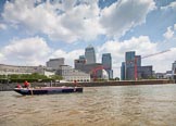 TOW River Thames Barge Driving Race 2013: Barge "Blackwall", by the Port of London Authority, in front the skyscrapers of Canary Wharf..
River Thames between Greenwich and Westminster,
London,

United Kingdom,
on 13 July 2013 at 13:11, image #285