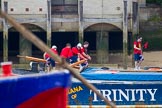 TOW River Thames Barge Driving Race 2013: Collecting a pennant from a moored barge - crew members of Barge "Diana", by Trinity Buoy Wharf..
River Thames between Greenwich and Westminster,
London,

United Kingdom,
on 13 July 2013 at 13:25, image #336