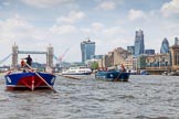 TOW River Thames Barge Driving Race 2013: Barge "Steve Faldo" by Capital Pleasure Boats, and barge "Diana", by Trinity Buoy Wharf, approaching Tower Bridge, On the right the Walkie Talkie- and the Gherkin building..
River Thames between Greenwich and Westminster,
London,

United Kingdom,
on 13 July 2013 at 13:35, image #367