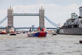 TOW River Thames Barge Driving Race 2013: Barge "Steve Faldo" by Capital Pleasure Boats, followed by barge "Blackwall", by the Port of London Authority, passing HMS Belfast, with Tower Bridge in the background..
River Thames between Greenwich and Westminster,
London,

United Kingdom,
on 13 July 2013 at 13:48, image #399