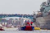 TOW River Thames Barge Driving Race 2013: Barge "Steve Faldo", by Capital Pleasure Boats, passing HMS Belfast. Behind, on the left, barge "Shell Bay" by South Dock Marina and barge "Spirit of Mountabatten", by Mechanical Movements and Enabling Services Ltd..
River Thames between Greenwich and Westminster,
London,

United Kingdom,
on 13 July 2013 at 13:49, image #400