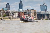 TOW River Thames Barge Driving Race 2013: Tug "Swiftstone" passing under the Millenium Footbridge. In the background the "Walkie Talkie" building..
River Thames between Greenwich and Westminster,
London,

United Kingdom,
on 13 July 2013 at 13:54, image #403