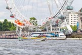 TOW River Thames Barge Driving Race 2013: Barge "Hoppy", by GPS Fabrication, at the London Eye, close to the finish of the race at Westminster Bridge..
River Thames between Greenwich and Westminster,
London,

United Kingdom,
on 13 July 2013 at 14:26, image #459