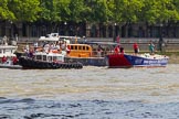 TOW River Thames Barge Driving Race 2013: Barge "Steve Faldo" by Capital Pleasure Boats, behind the finish line at Westminster Bridge, ready to be towed back to Greenwich by tug "Bulldog". Behind them is MV Havengore, hosting VIP guests..
River Thames between Greenwich and Westminster,
London,

United Kingdom,
on 13 July 2013 at 14:33, image #483