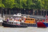 TOW River Thames Barge Driving Race 2013: Barge "Steve Faldo" by Capital Pleasure Boats, behind the finish line at Westminster Bridge, ready to be towed back to Greenwich by tug "Bulldog". Behind them is MV Havengore, hosting VIP guests..
River Thames between Greenwich and Westminster,
London,

United Kingdom,
on 13 July 2013 at 14:33, image #484