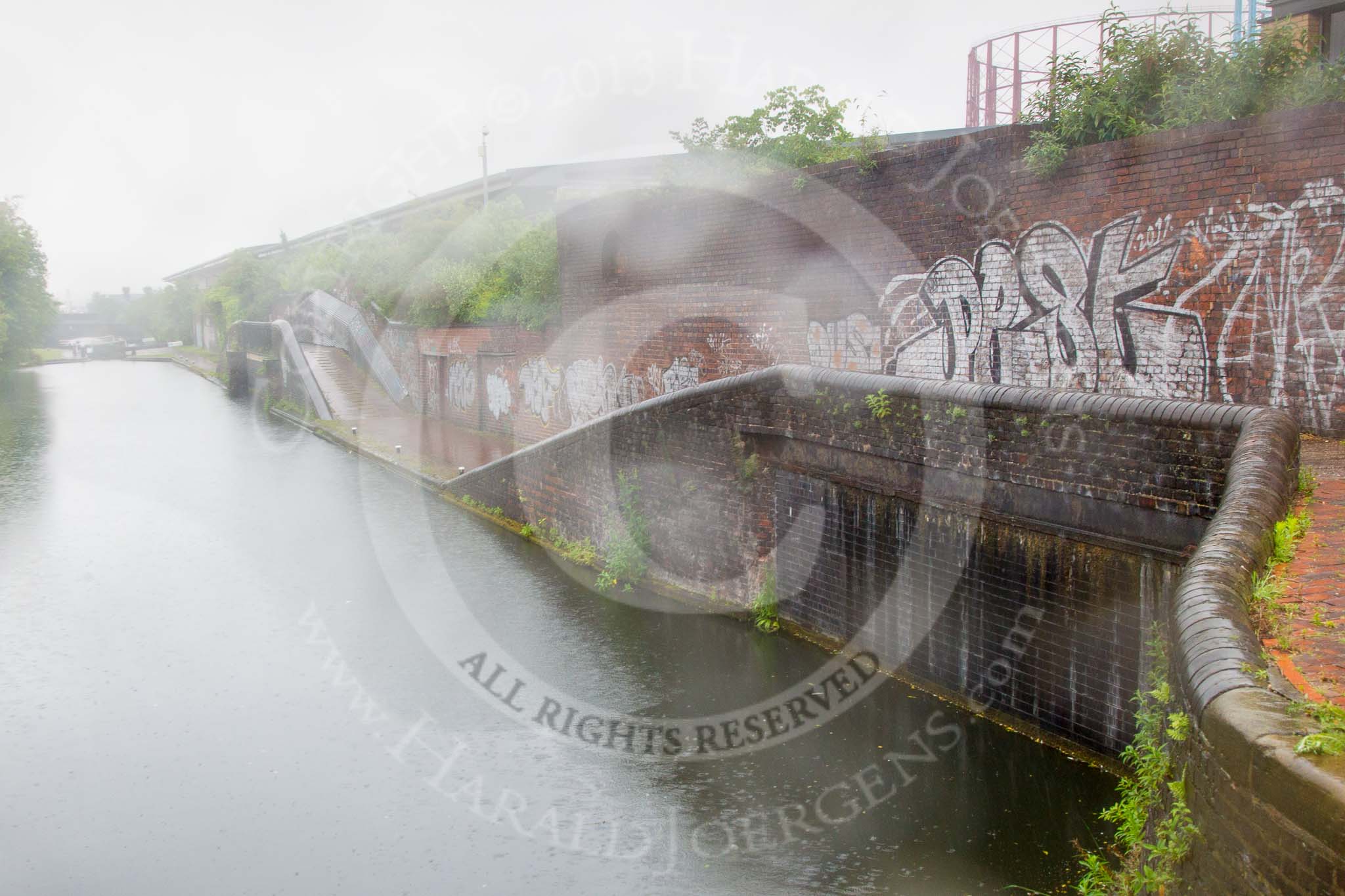 BCN Marathon Challenge 2014: Bricked up factory bridges on the Birmingham & Fazeley Canal between Dartmouth Middleway Bridge and Avenue Road Bridge. The former branches served the gas works..
Birmingham Canal Navigation,


United Kingdom,
on 24 May 2014 at 10:45, image #110