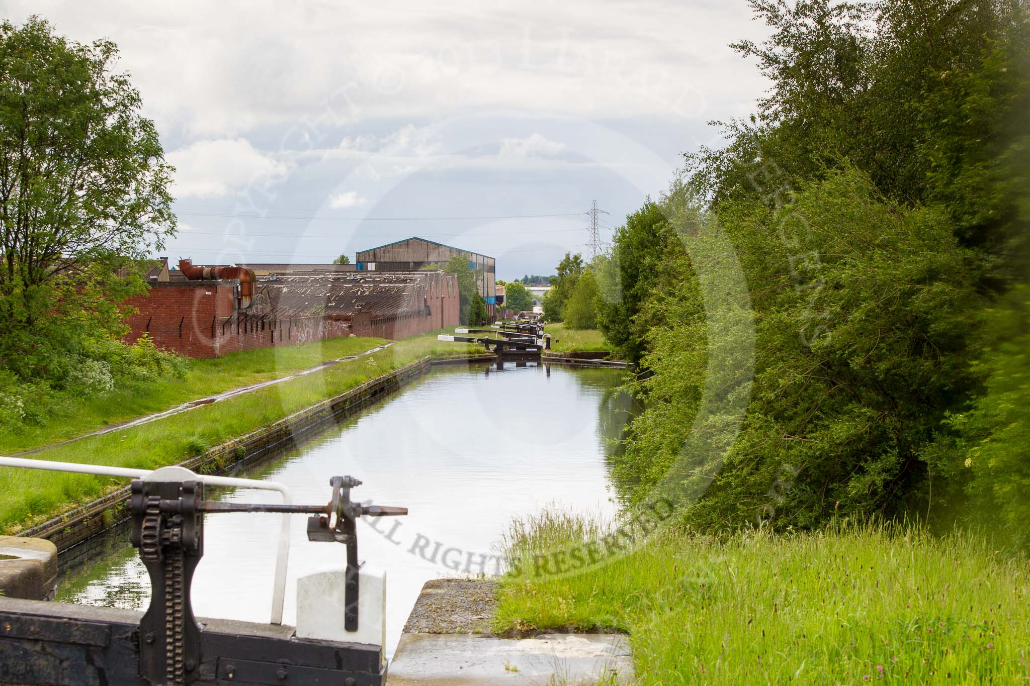 BCN Marathon Challenge 2014: Riders Green Locks on the Walsall Canal, with another old factory building on the left that might be gone in the next few years.
Birmingham Canal Navigation,


United Kingdom,
on 24 May 2014 at 16:56, image #163