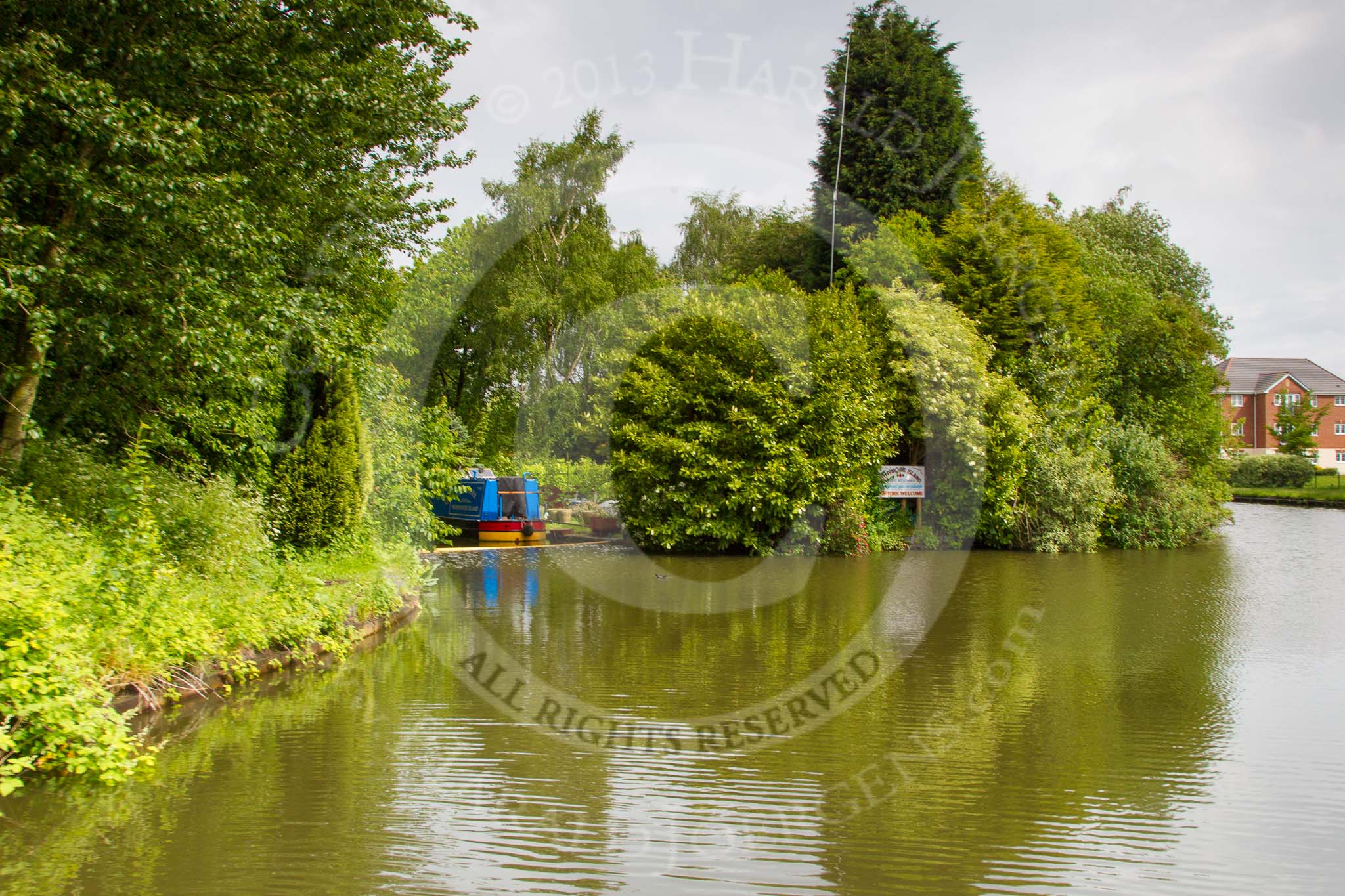 BCN Marathon Challenge 2014: Withymoor Island, Dudley No 2 Canal close to Bishtons Bridge. The canal arm on the left only looks like a very short arm, serving lime kilns. Is today's arm a newer development?.
Birmingham Canal Navigation,


United Kingdom,
on 25 May 2014 at 10:28, image #226