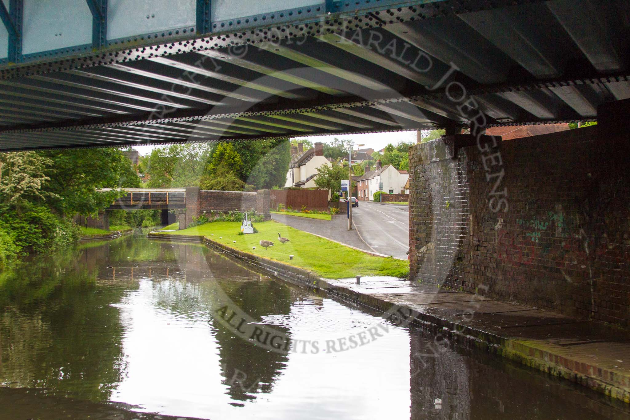 BCN Marathon Challenge 2014: Railway- and road bridge on the Dudley No 2 Canal close to Gosty Hill Tunnel, with the adjacent Station Road almost at canal level.
Birmingham Canal Navigation,


United Kingdom,
on 25 May 2014 at 11:19, image #231