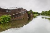 BCN Marathon Challenge 2014: Bridge on the Dudley No 1 Canal leading to a Shropshire Union basin with an old warehouse and stables carrying an LMS advertisment.
Birmingham Canal Navigation,


United Kingdom,
on 25 May 2014 at 06:55, image #212