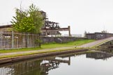BCN 24h Marathon Challenge 2015: Chillington Wharf Railway interchange basin at Bilston Road on the BCN Main Line.
"This is now the best example of an interchange basin on the BCN. The basin, shed and railway tracks are in good condition and form part of the Wolverhampton Steel Terminal. Transhipments still occur here, using the crane on the left of the basin, but now steel is transferred from rail to road rather than to canal. Chillingtom Wharf is of historical interest and must be a prime candidate for preservation" (Birmingham Canal Navigations, 1984).
Birmingham Canal Navigations,



on 24 May 2015 at 08:24, image #173