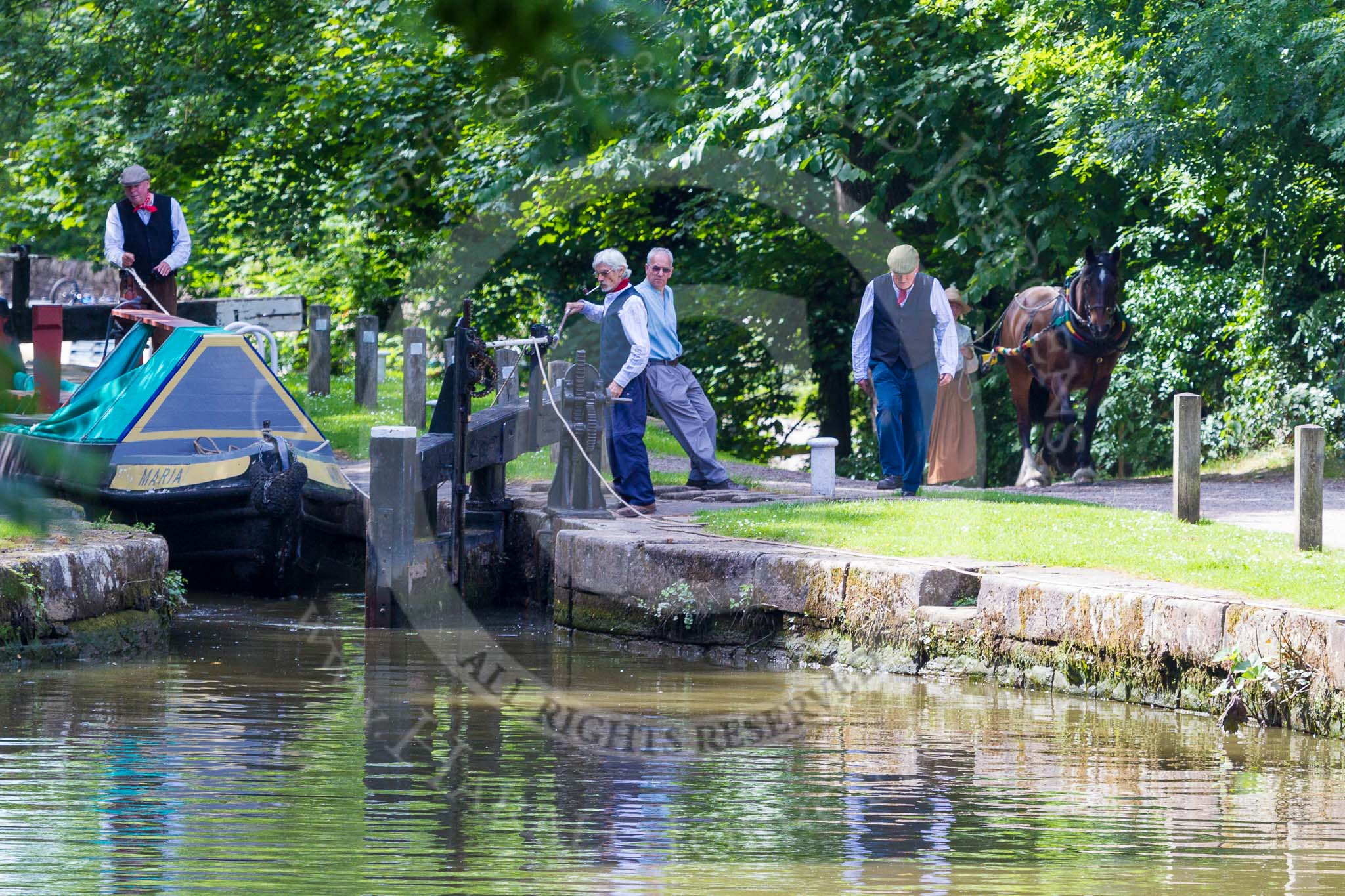 : Narrowboat Maria is ready to leave Marple bottom lock, boat horse Bilbo is on the way to pick up the tow line.




on 03 July 2015 at 15:32, image #34