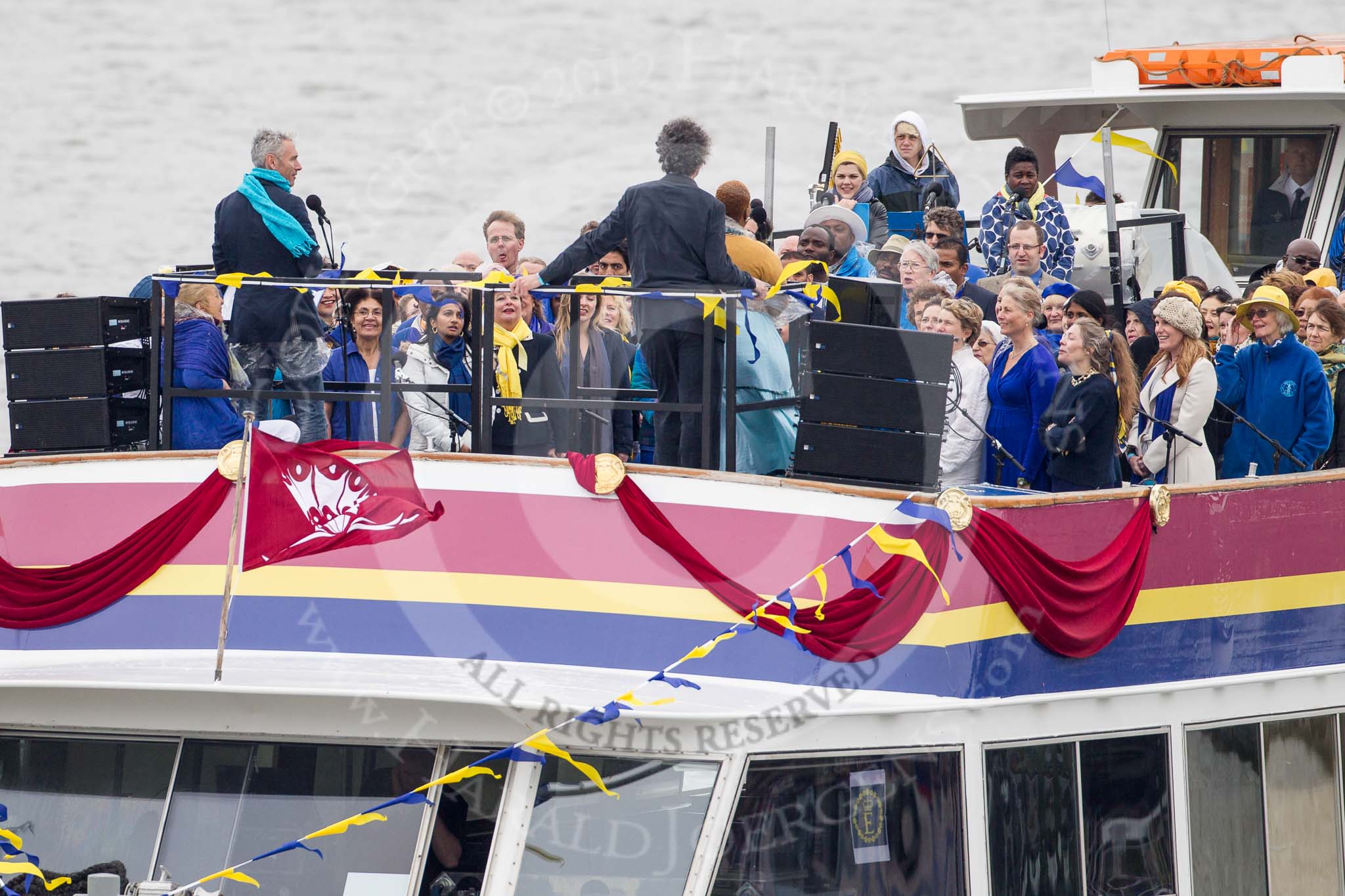 Thames Diamond Jubilee Pageant: JUBILANT COMMONWEALTH CHOIR- Silver Bonito (H104)..
River Thames seen from Battersea Bridge,
London,

United Kingdom,
on 03 June 2012 at 15:30, image #371