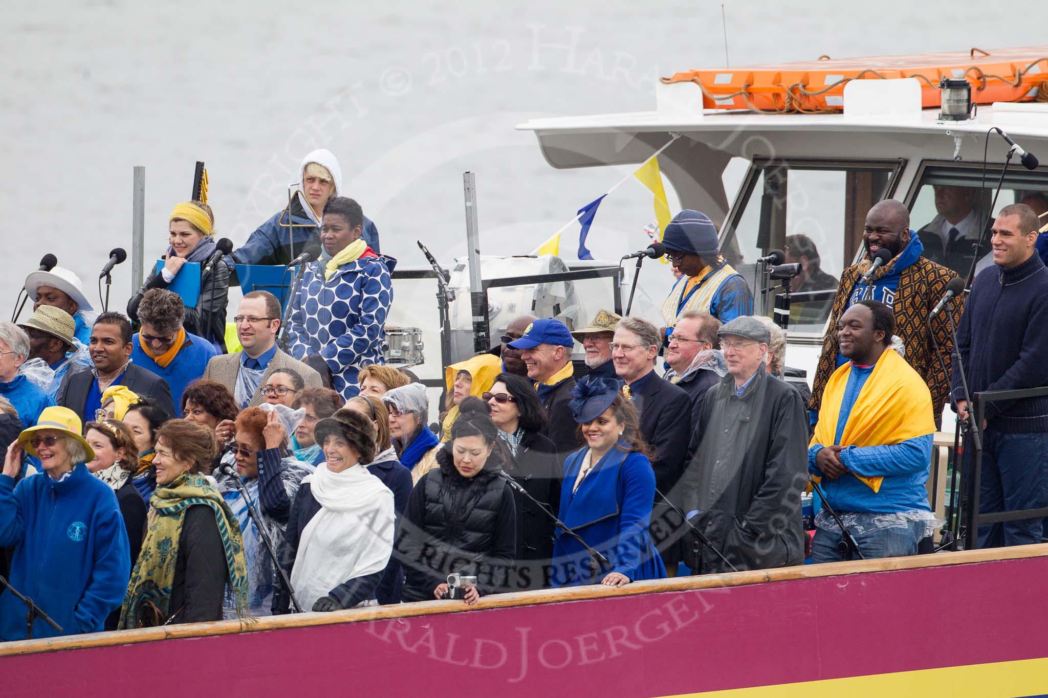 Thames Diamond Jubilee Pageant: JUBILANT COMMONWEALTH CHOIR- Silver Bonito (H104)..
River Thames seen from Battersea Bridge,
London,

United Kingdom,
on 03 June 2012 at 15:30, image #373