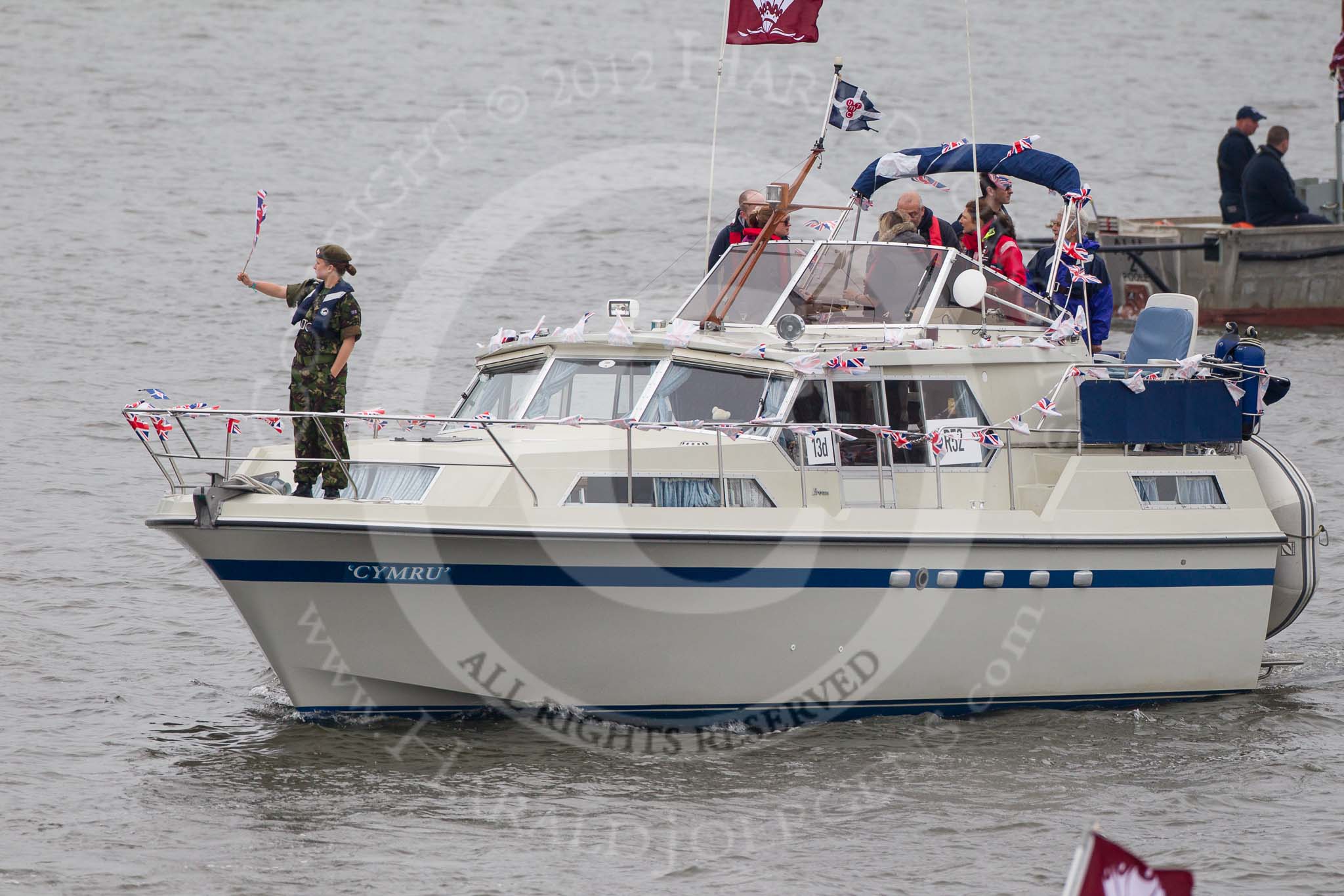 Thames Diamond Jubilee Pageant: RECREATIONAL MOTOR BOATS-Cymru (R52)..
River Thames seen from Battersea Bridge,
London,

United Kingdom,
on 03 June 2012 at 15:45, image #434