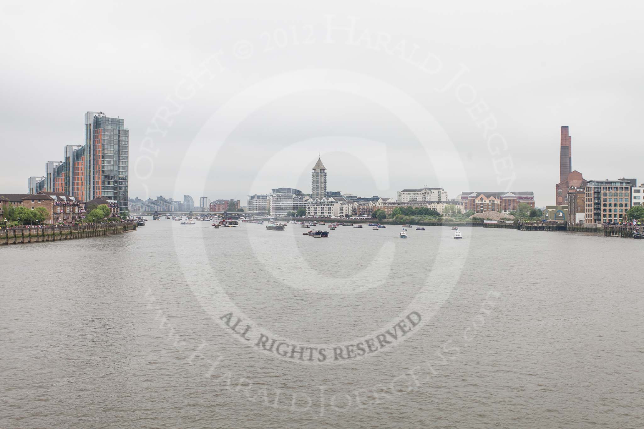 Thames Diamond Jubilee Pageant: The flotilla of narrowboats emerging below Battersea Rail Bridge.
River Thames seen from Battersea Bridge,
London,

United Kingdom,
on 03 June 2012 at 15:50, image #440