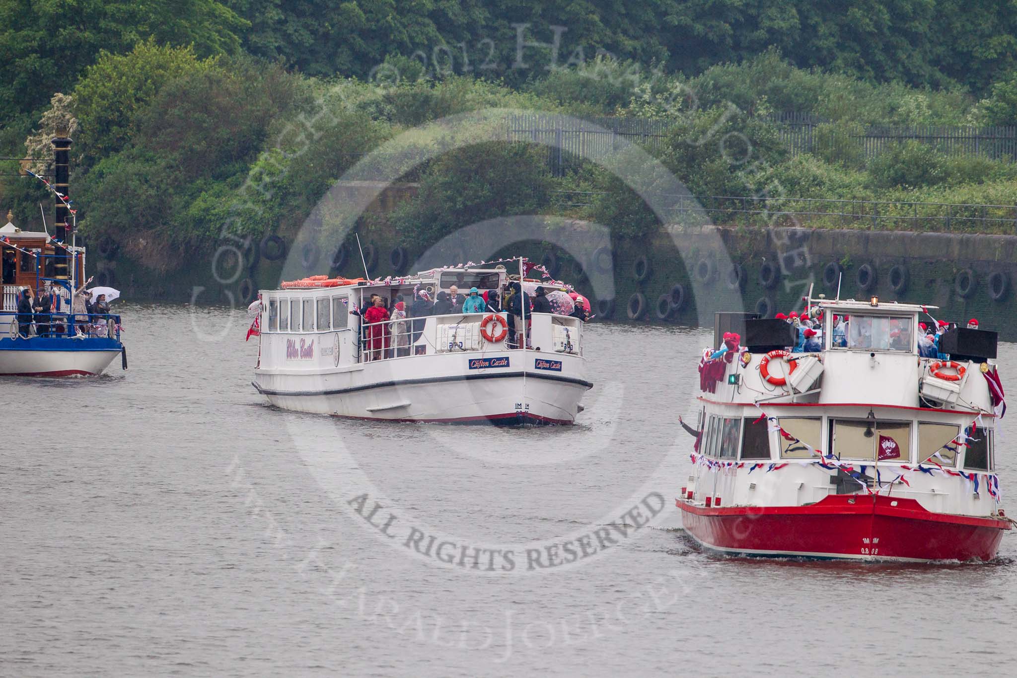 Thames Diamond Jubilee Pageant: THE MAYOR'S JUBILEE BAND-Westminister (C1) and PASSENGER BOATS- Clifton Castle (C2)..
River Thames seen from Battersea Bridge,
London,

United Kingdom,
on 03 June 2012 at 16:05, image #518