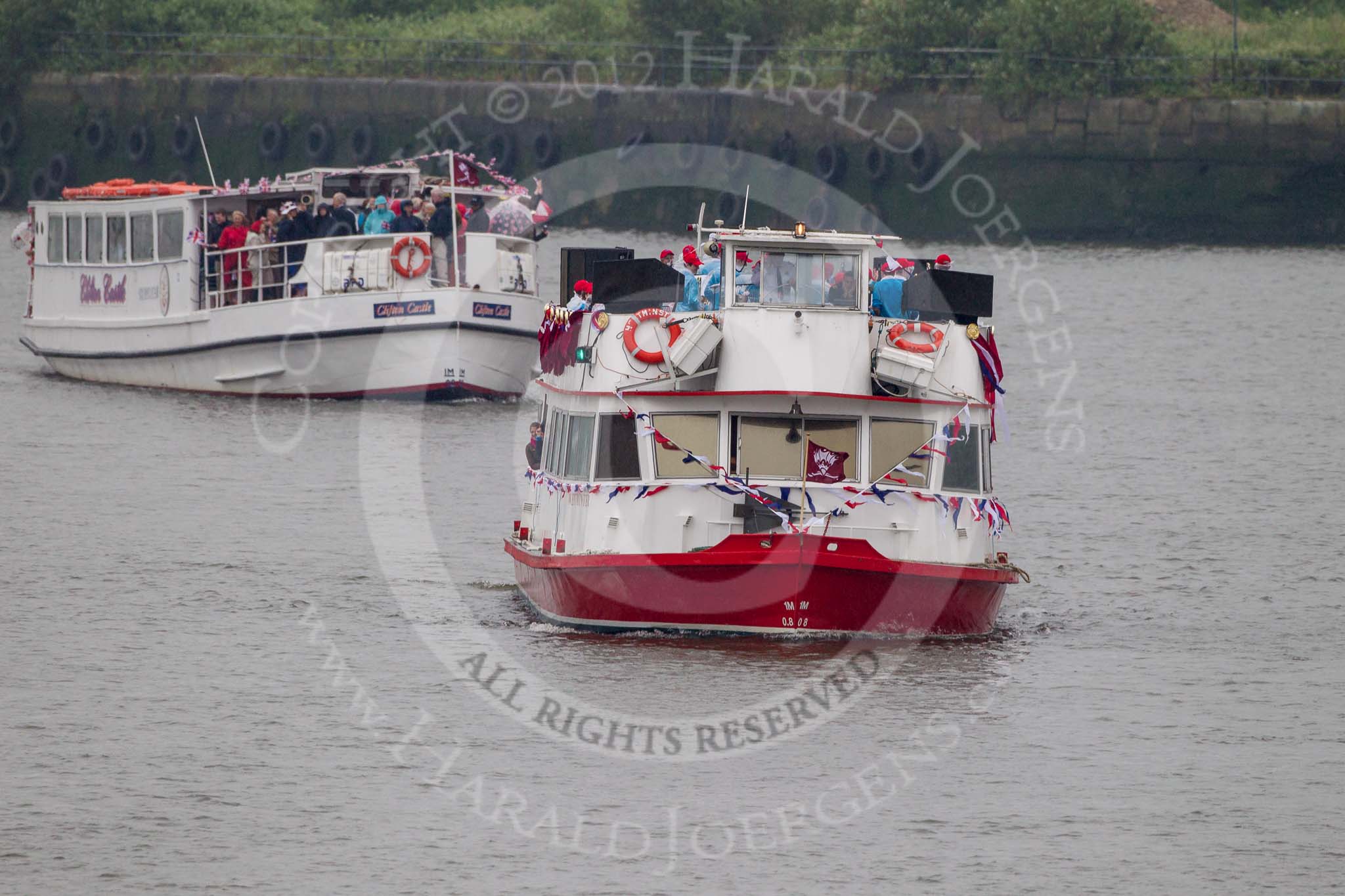 Thames Diamond Jubilee Pageant: THE MAYOR'S JUBILEE BAND-Westminister (C1) and PASSENGER BOATS- Clifton Castle (C2)..
River Thames seen from Battersea Bridge,
London,

United Kingdom,
on 03 June 2012 at 16:06, image #519