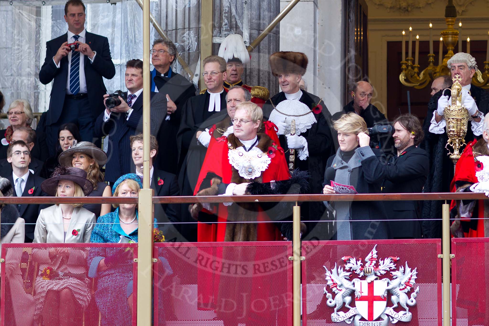 The Lord Mayor's Show 2011: The new Lord Mayor, David Wootton, on the balcony of Mansion House. On his left the BBC's Clare Balding, with a cameraman, reporting live..
Opposite Mansion House, City of London,
London,
-,
United Kingdom,
on 12 November 2011 at 11:49, image #509