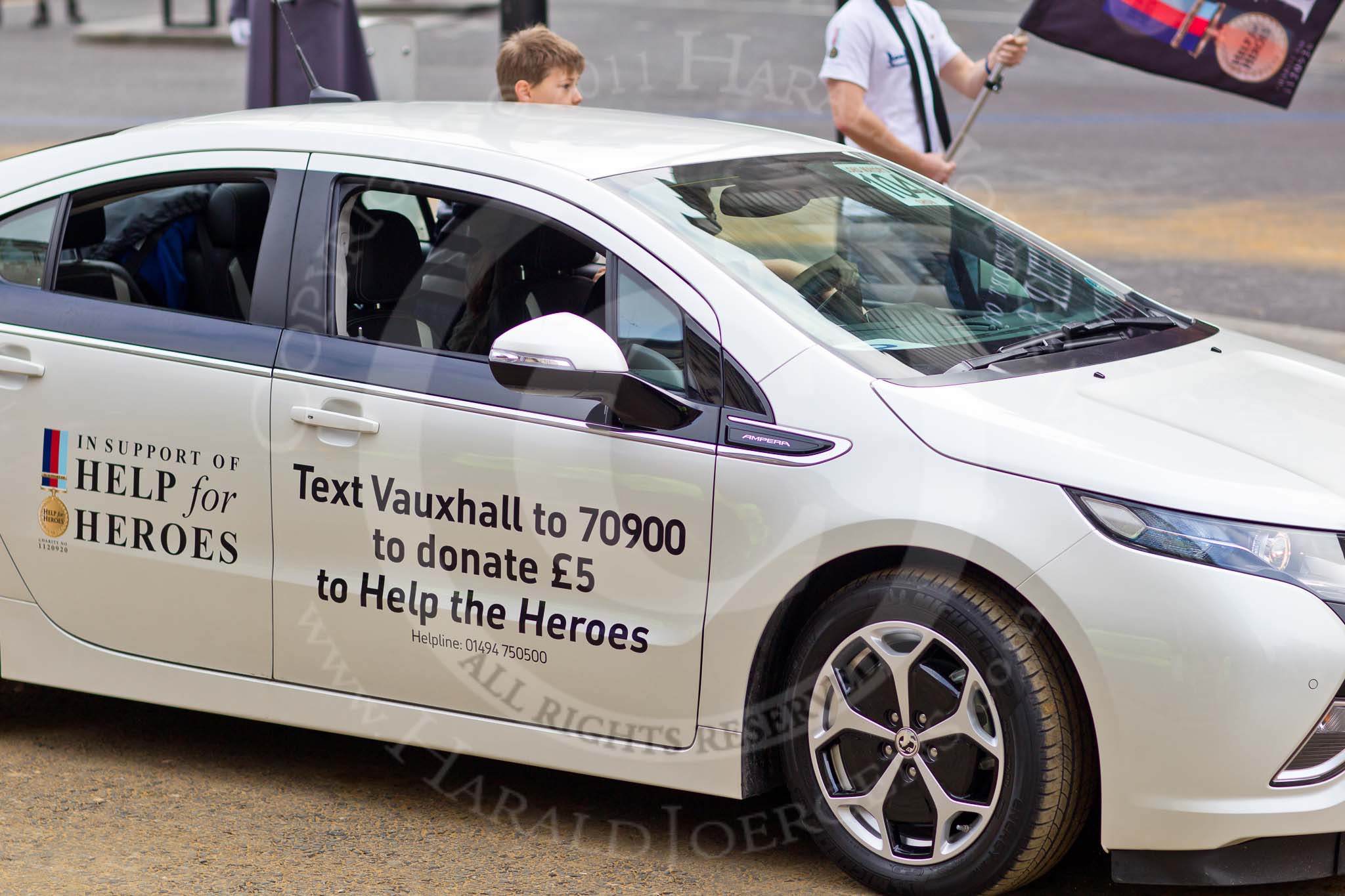 The Lord Mayor's Show 2011: Vauxhall Motors (http://www.vauxhall.co.uk/), here with a Vauxhall Ampera car..
Opposite Mansion House, City of London,
London,
-,
United Kingdom,
on 12 November 2011 at 11:59, image #595