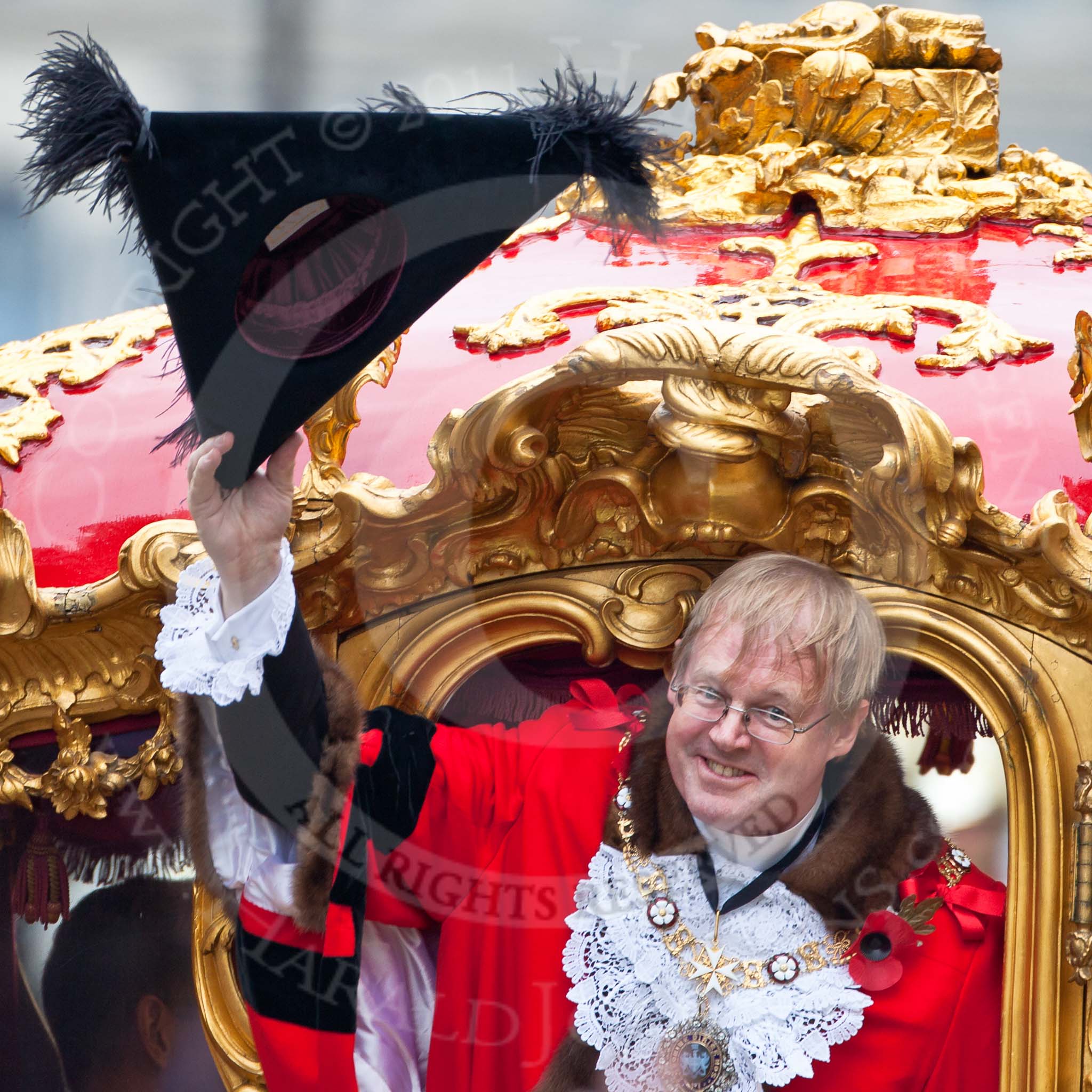 The Lord Mayor's Show 2011: The new Lord Mayor, David Wootton, waving from the golden state coach that is about to carry him to St Pauls Catherdral..
Opposite Mansion House, City of London,
London,
-,
United Kingdom,
on 12 November 2011 at 12:19, image #759