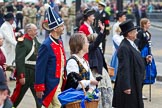 The Lord Mayor's Show 2011: The Guilds of Zurich. The ladies are carrying Swiss chocolate for the specatators in their baskets..
Opposite Mansion House, City of London,
London,
-,
United Kingdom,
on 12 November 2011 at 11:41, image #431