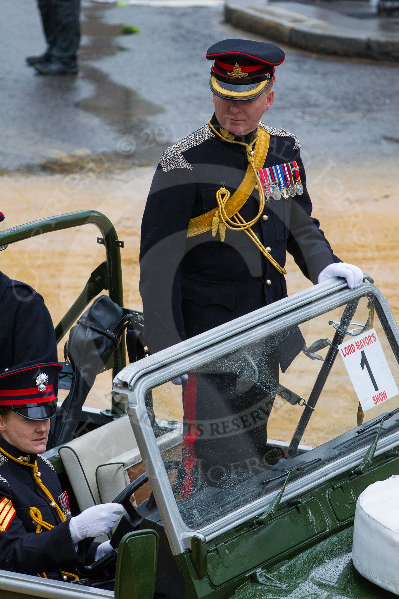 Lord Mayor's Show 2012: Entry 1, HAC, the Honourable Artillery Company, here Major Jonny Longbottom (sp?), commanding the Gun Detachment of the Honourable Artillery Company (HAC)..
Press stand opposite Mansion House, City of London,
London,
Greater London,
United Kingdom,
on 10 November 2012 at 10:14, image #31