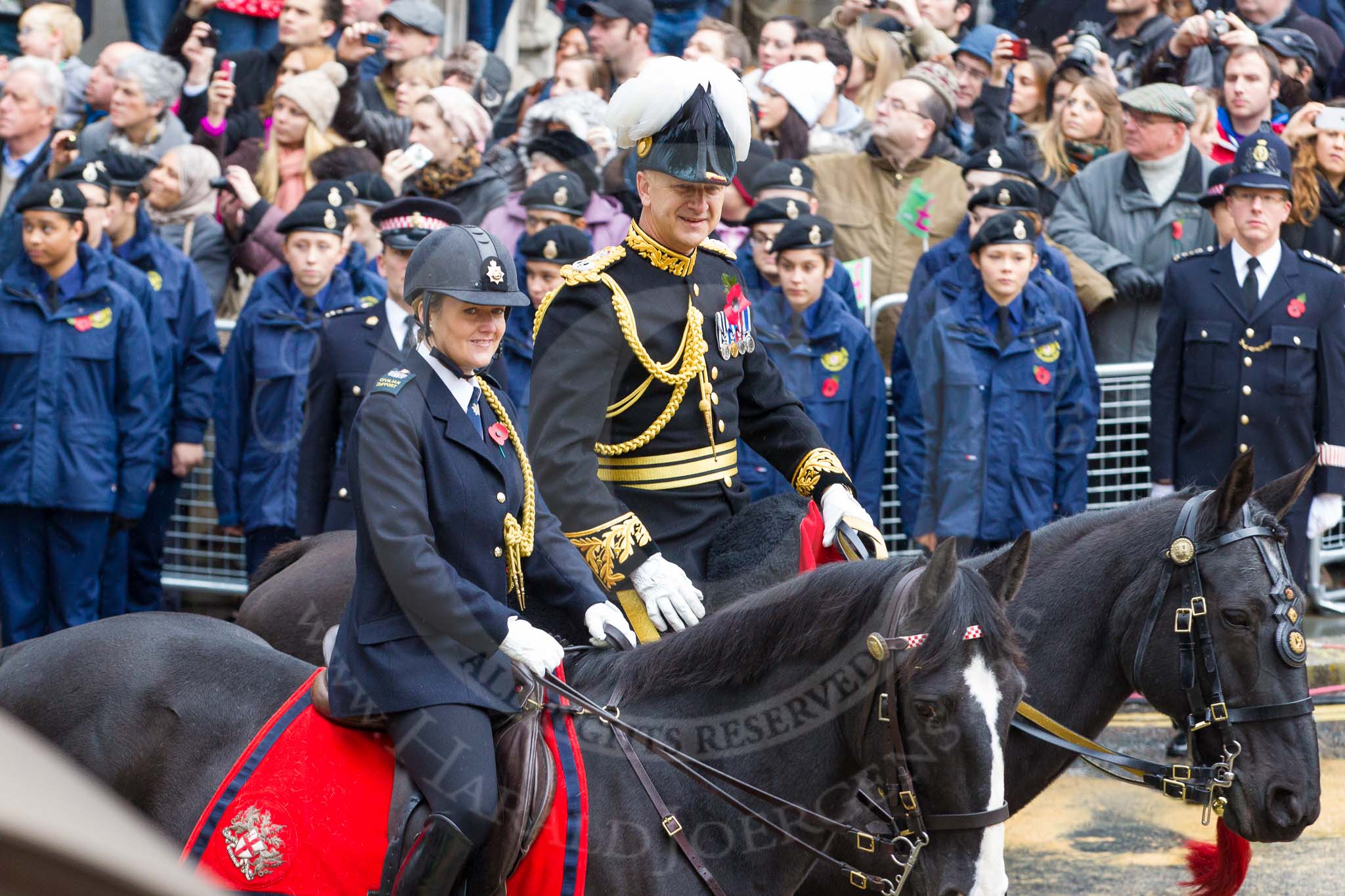 Lord Mayor's Show 2012: Rebecca Jenkins, senior Police Staff Trainer within the City of London Police mounted branch, and Adrian Leppard, Commissioner of the City of London Police..
Press stand opposite Mansion House, City of London,
London,
Greater London,
United Kingdom,
on 10 November 2012 at 10:48, image #115