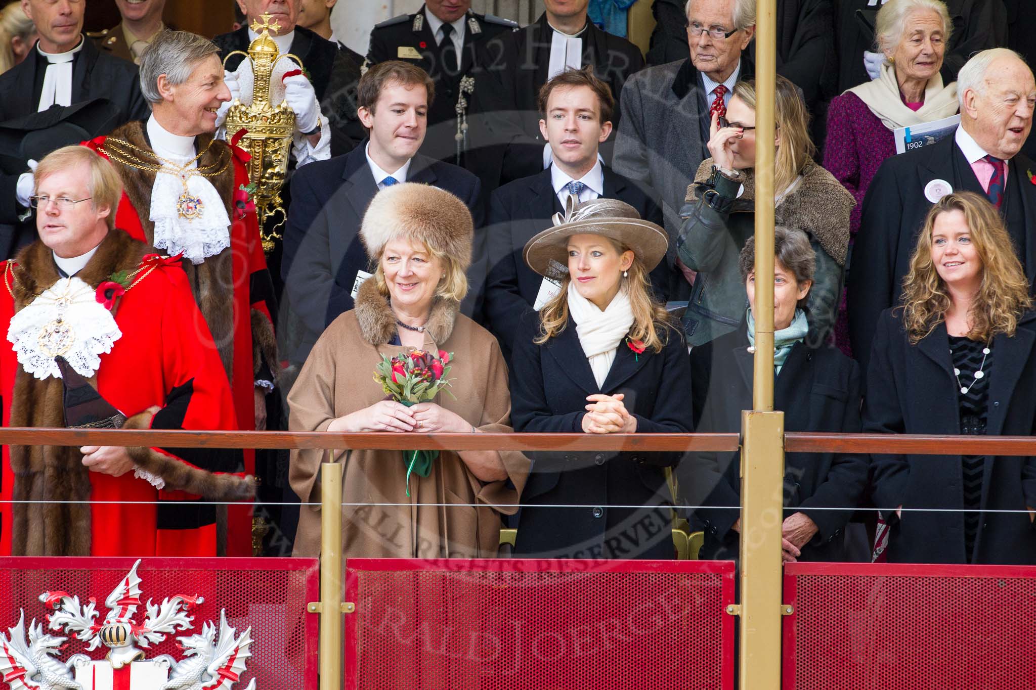 Lord Mayor's Show 2012: The outgoing Lord Mayor, David Wootton, the outgoing Lady Mayoress, Liz Wootton, the stunningly beautiful Sophie Wootton, and James and Christopher Wootton behind..
Press stand opposite Mansion House, City of London,
London,
Greater London,
United Kingdom,
on 10 November 2012 at 10:59, image #184