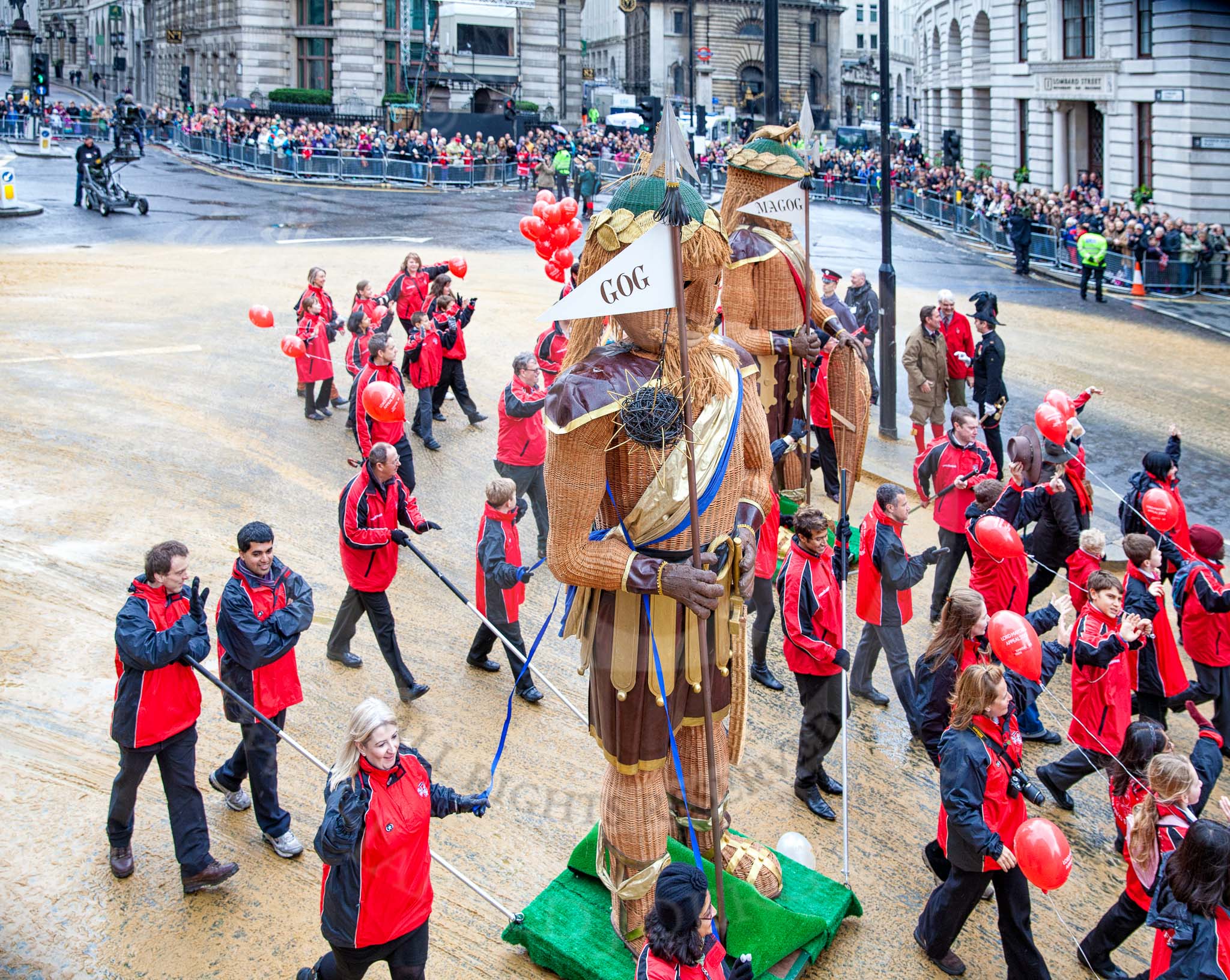 Lord Mayor's Show 2012: Society of Young Freemen / Gog&Magog / 100 Reg't RA(V) (100 Regiment Royal Artillery Volunteers)..
Press stand opposite Mansion House, City of London,
London,
Greater London,
United Kingdom,
on 10 November 2012 at 11:02, image #217
