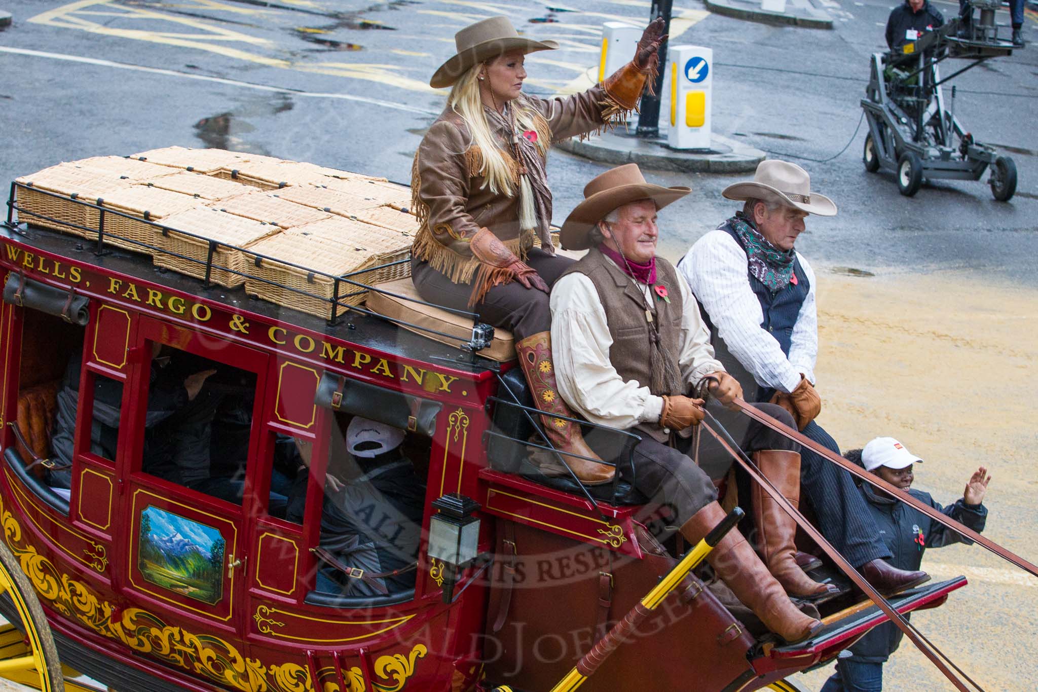 Lord Mayor's Show 2012: Entry 10, Wells Fargo and Company, with the Wells fargo stagecoach..
Press stand opposite Mansion House, City of London,
London,
Greater London,
United Kingdom,
on 10 November 2012 at 11:04, image #265