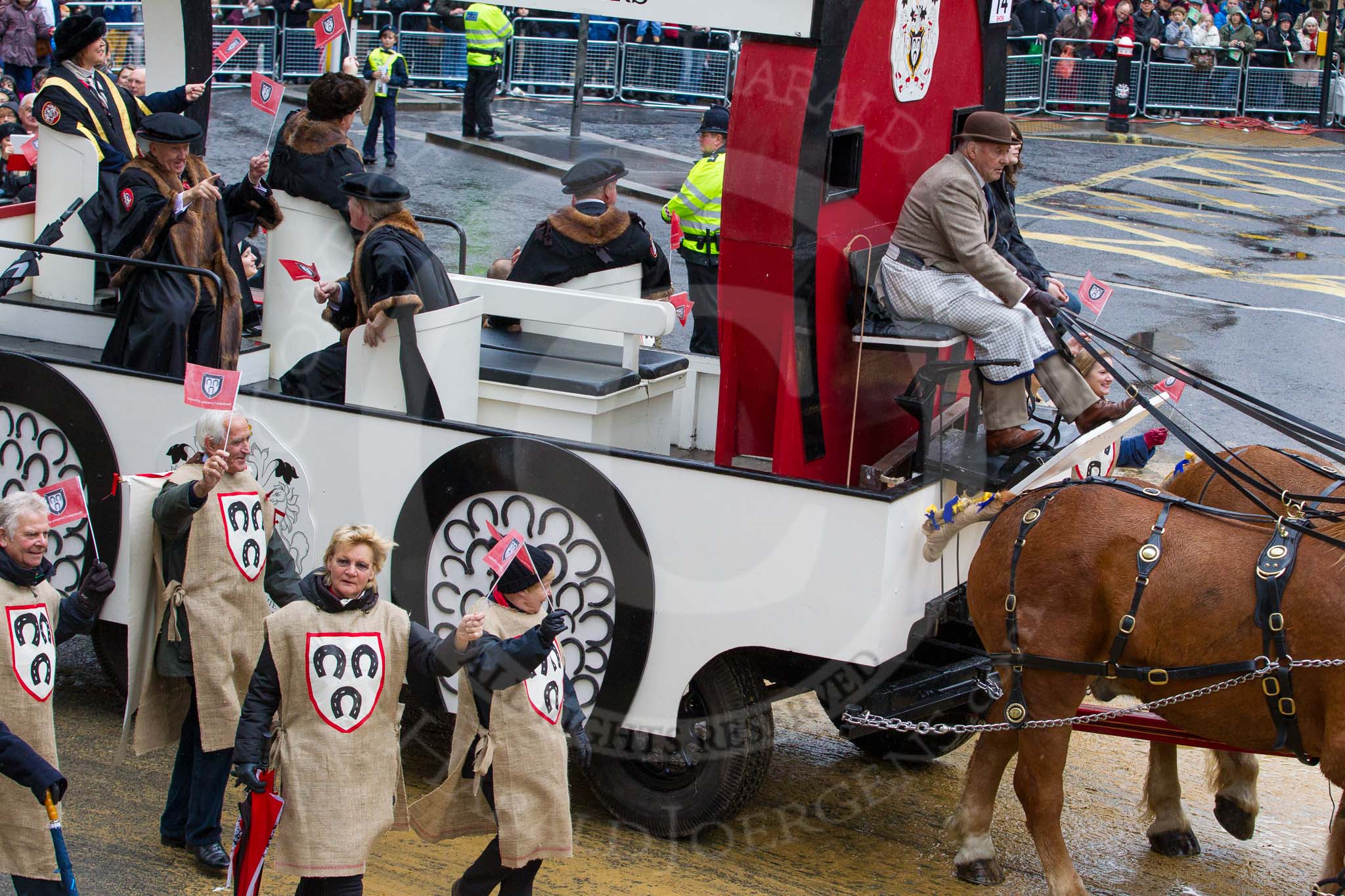 Lord Mayor's Show 2012: Entry 14 - Worshipful Company of Farriers..
Press stand opposite Mansion House, City of London,
London,
Greater London,
United Kingdom,
on 10 November 2012 at 11:06, image #303