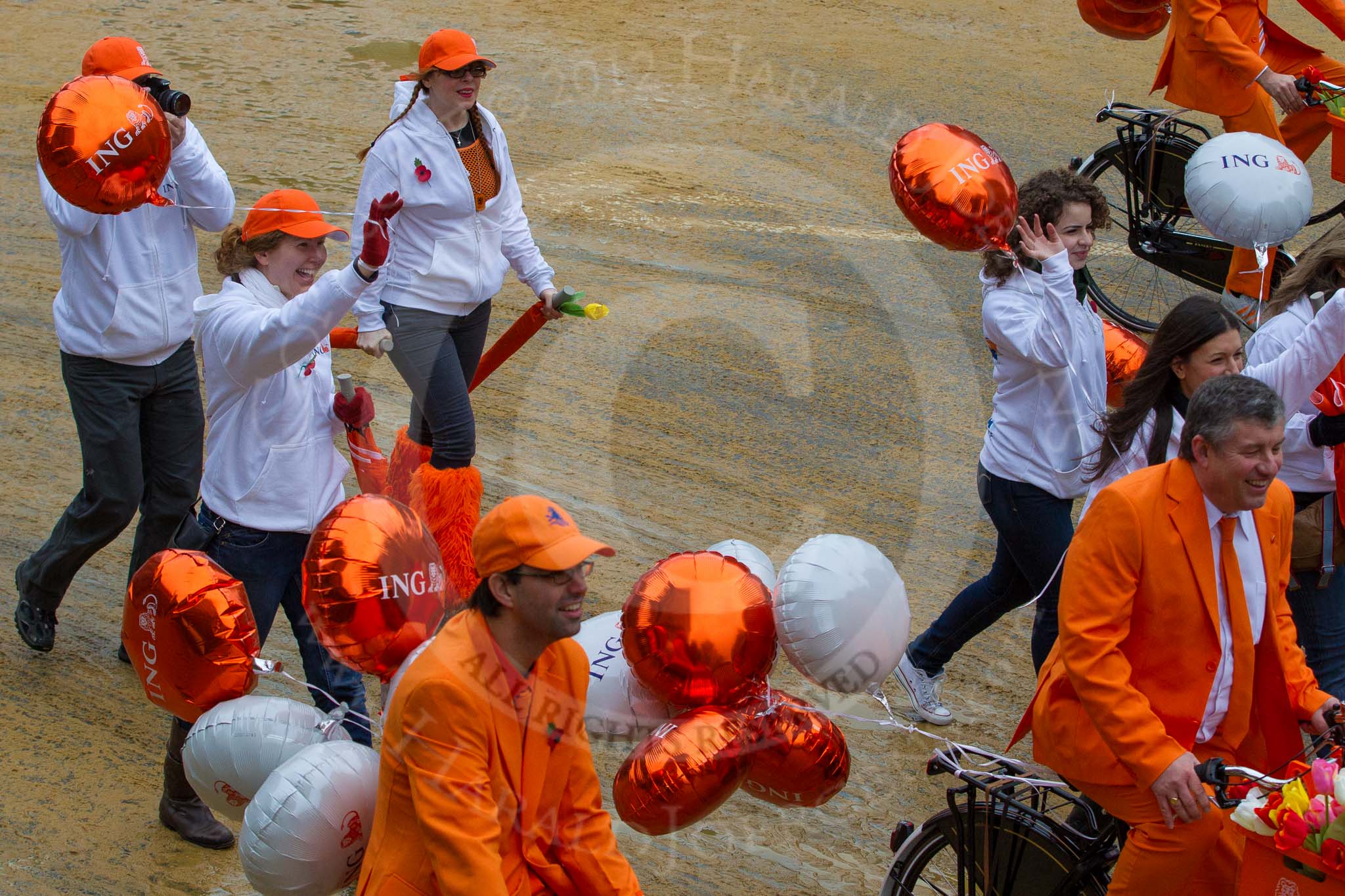 Lord Mayor's Show 2012: Entry 34 - ING Commercial Banking, bringing Amsterdam's 'orange spirit' to London..
Press stand opposite Mansion House, City of London,
London,
Greater London,
United Kingdom,
on 10 November 2012 at 11:14, image #526