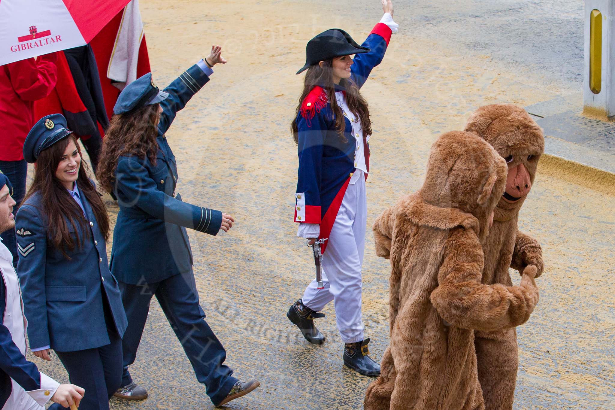 Photo 1211101117471D45836HaraldJoergens Lord Mayor's Show 2012: Entry 41 - Gibraltar, Gibraltarian students depicting the three main pillars of Gibraltar's economy: tourism, port activities, and finance..
Press stand opposite Mansion House, City of London,
London,
Greater London,
United Kingdom,
on 10 November 2012 at 11:17, image #583