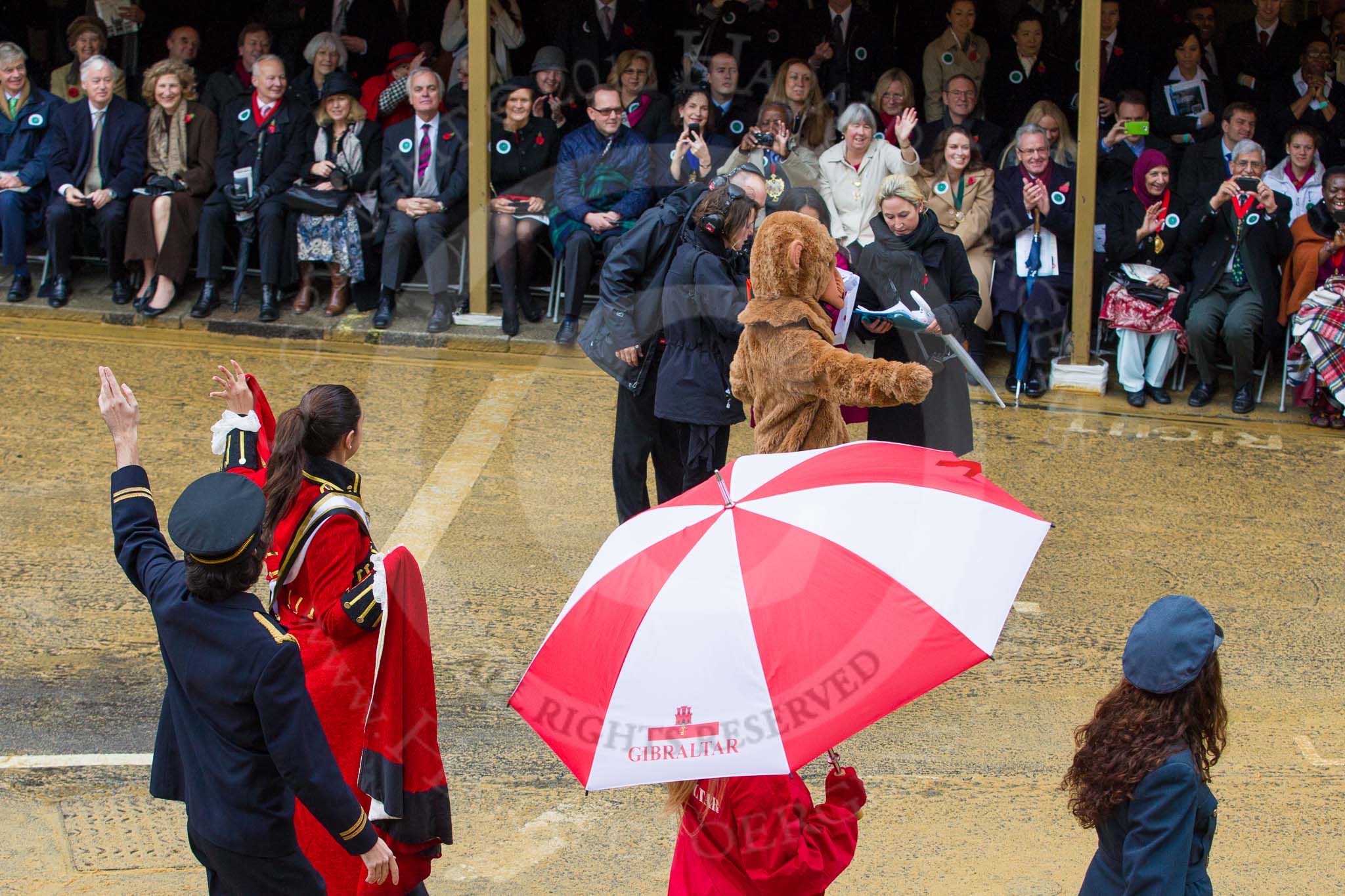 Photo 1211101117591D45846HaraldJoergens Lord Mayor's Show 2012: Entry 41 - Gibraltar, Gibraltarian students depicting the three main pillars of Gibraltar's economy: tourism, port activities, and finance..
Press stand opposite Mansion House, City of London,
London,
Greater London,
United Kingdom,
on 10 November 2012 at 11:17, image #588