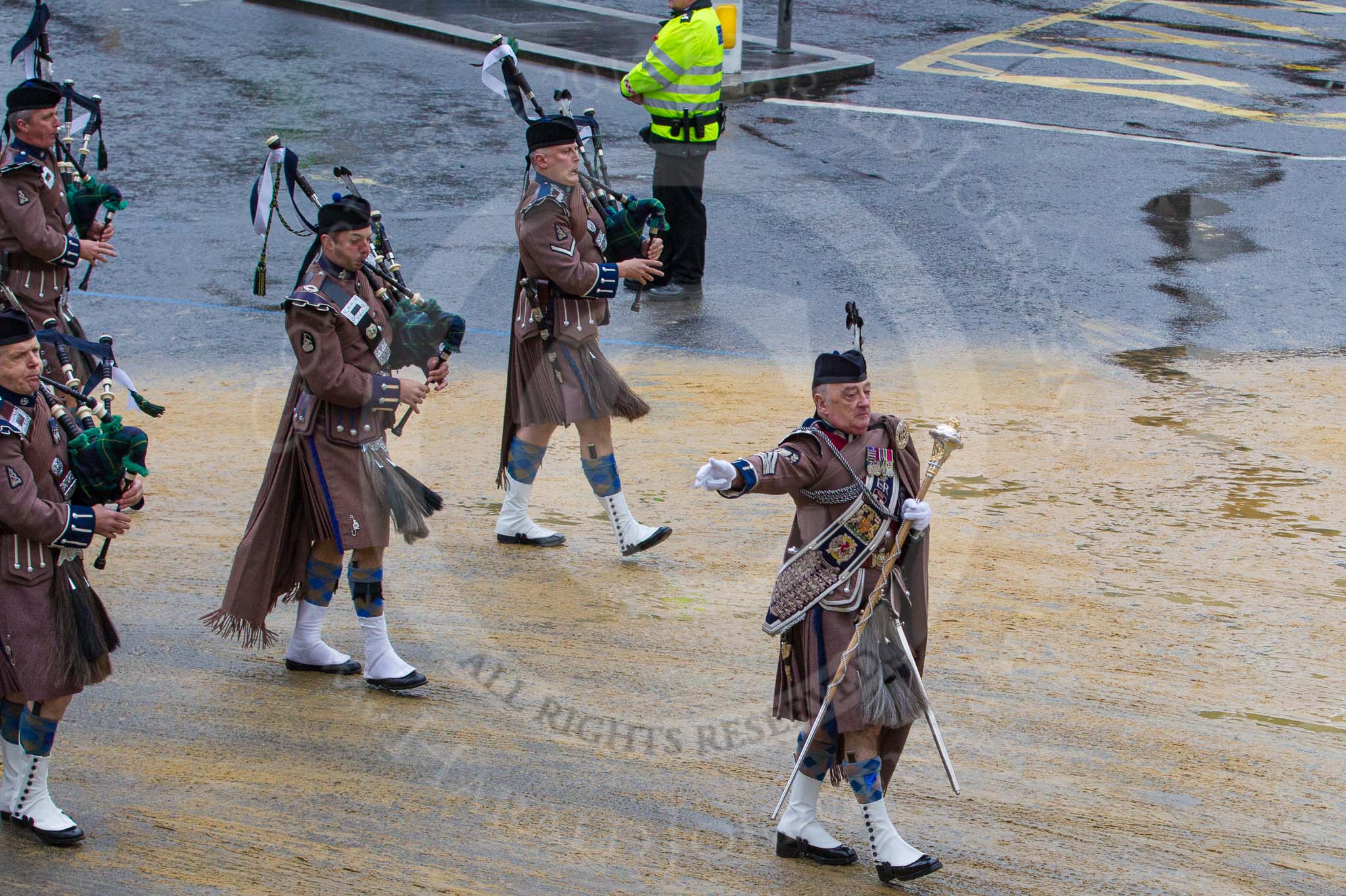 Lord Mayor's Show 2012: Entry 48 - The Pipes & Drums of the London Regiment, the only TA infantry battalion based in London..
Press stand opposite Mansion House, City of London,
London,
Greater London,
United Kingdom,
on 10 November 2012 at 11:20, image #652