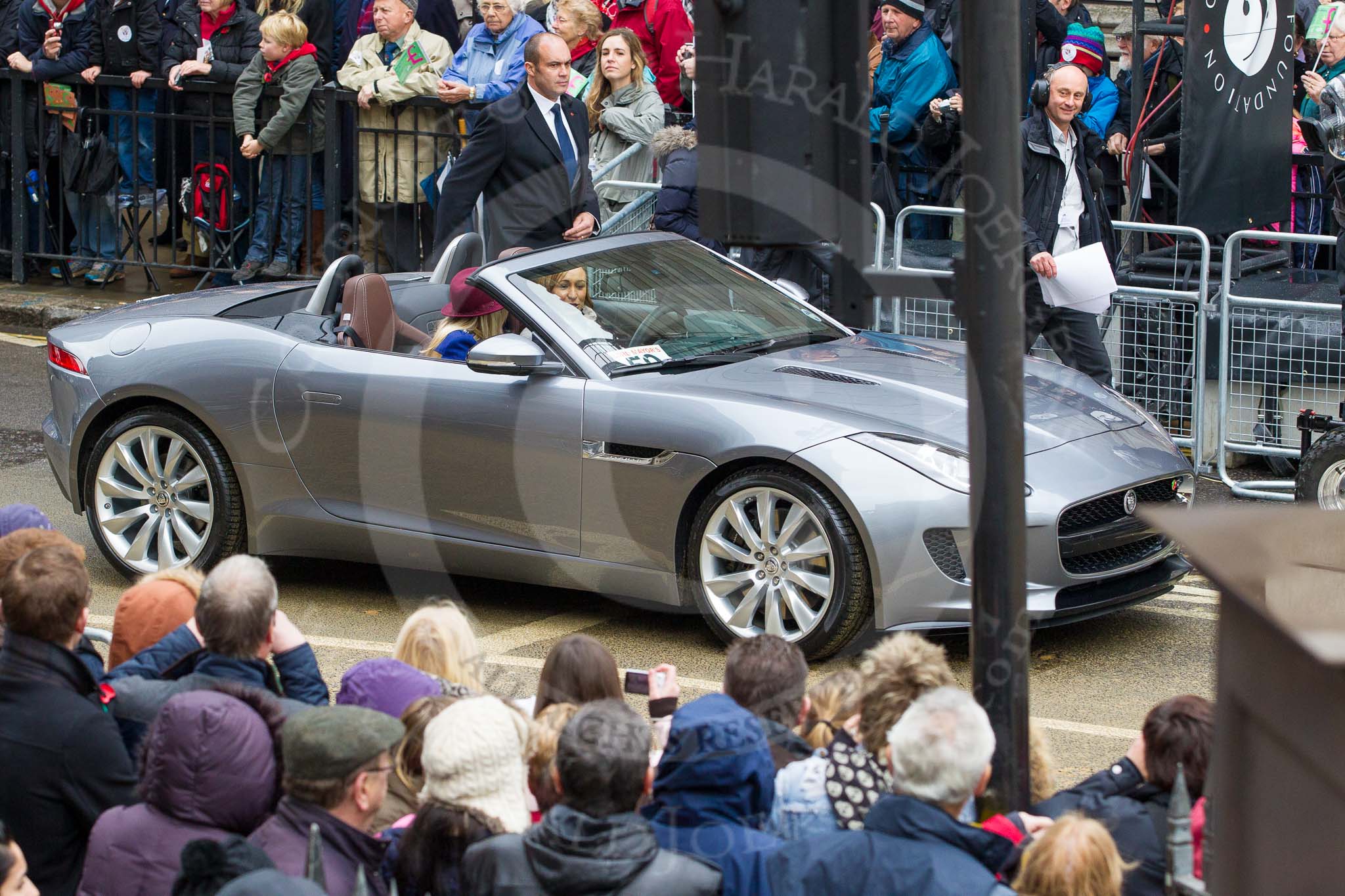 Lord Mayor's Show 2012: Entry 59 - Jaguar, here the new F-type, with the London 2012 Olympic heptathlon champion Jessica Ennis and BBC's Helen Skelton..
Press stand opposite Mansion House, City of London,
London,
Greater London,
United Kingdom,
on 10 November 2012 at 11:26, image #761