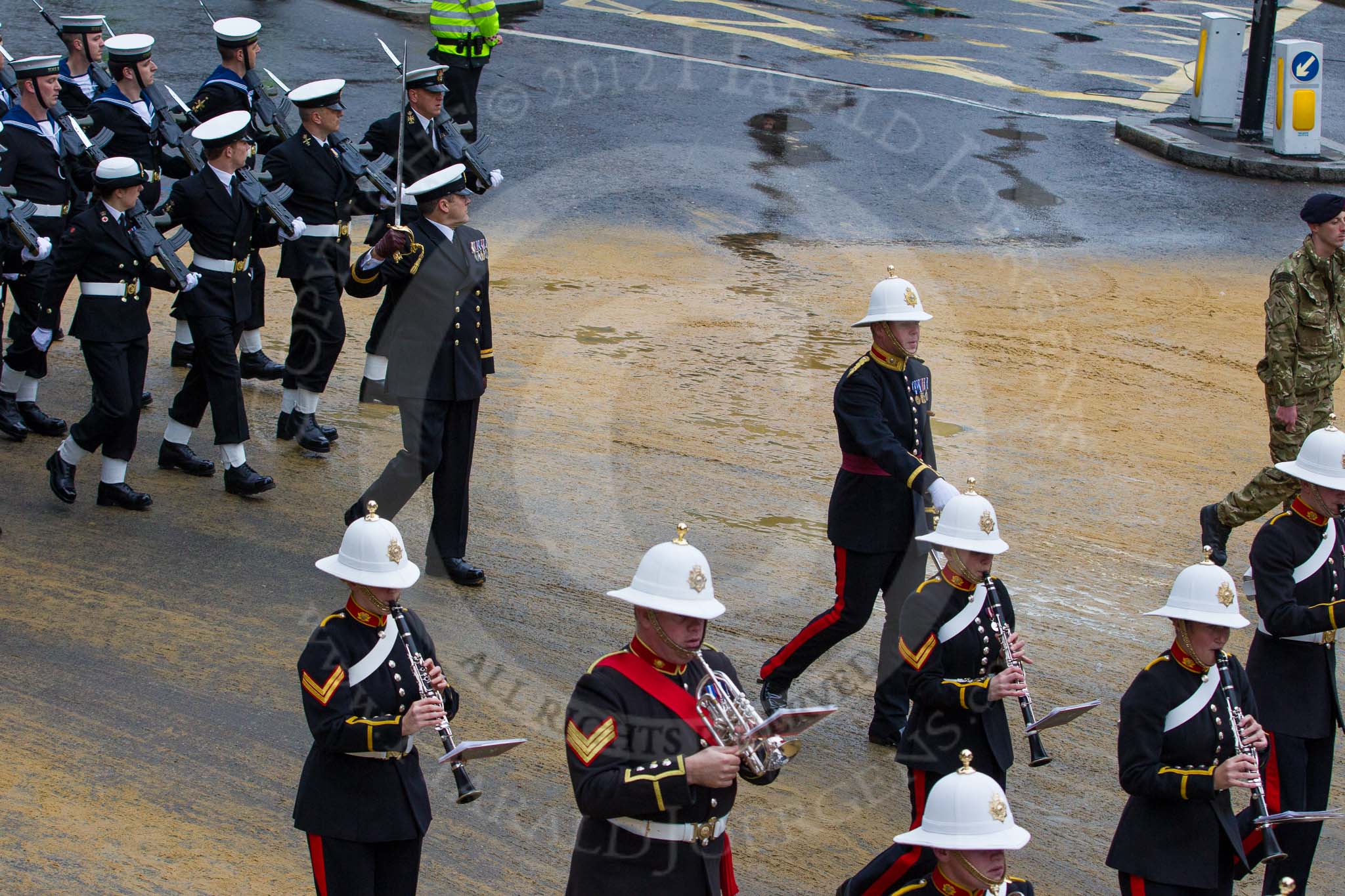 Lord Mayor's Show 2012: Entry 86 - Royal Marines Band (HMS Collingwood)..
Press stand opposite Mansion House, City of London,
London,
Greater London,
United Kingdom,
on 10 November 2012 at 11:38, image #1145