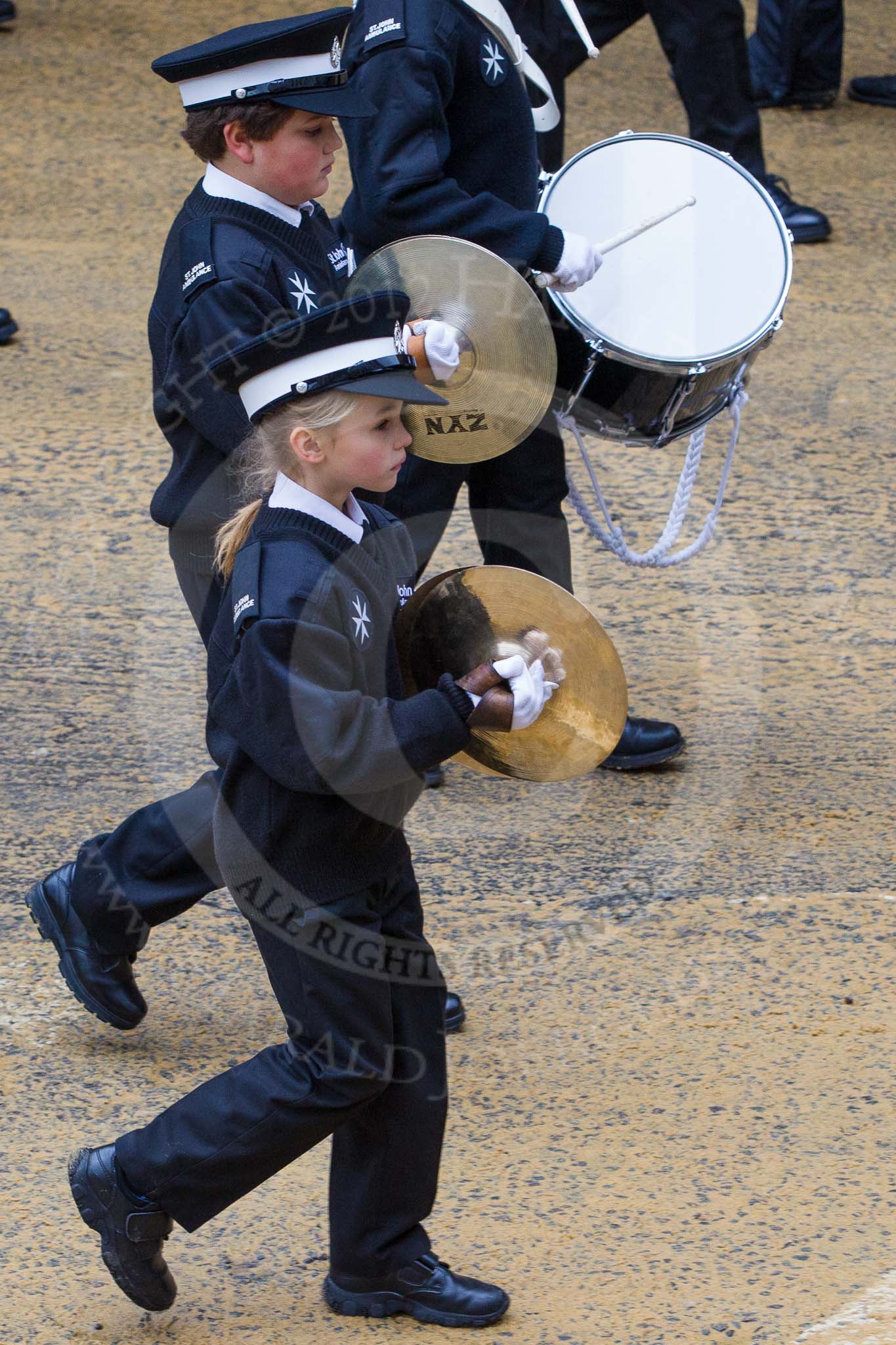 Lord Mayor's Show 2012: Entry 92 - St John Ambulance Talbot Corps of Drums..
Press stand opposite Mansion House, City of London,
London,
Greater London,
United Kingdom,
on 10 November 2012 at 11:41, image #1229