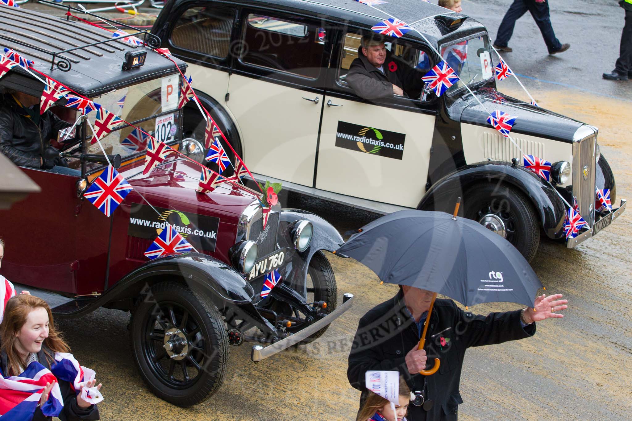 Lord Mayor's Show 2012: Entry 102 - Radio Taxis, supporting the charity Action for Kids..
Press stand opposite Mansion House, City of London,
London,
Greater London,
United Kingdom,
on 10 November 2012 at 11:49, image #1371