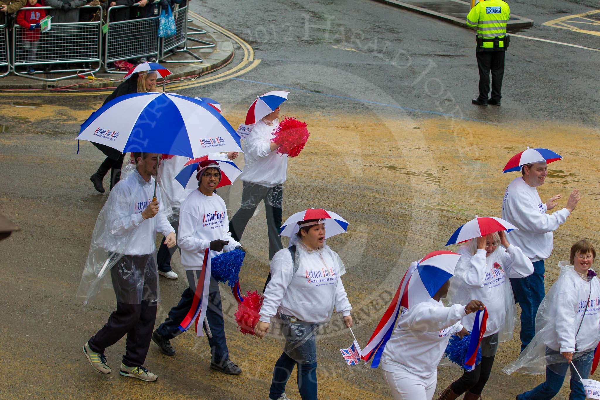 Lord Mayor's Show 2012: Entry 102 - Radio Taxis, supporting the charity Action for Kids..
Press stand opposite Mansion House, City of London,
London,
Greater London,
United Kingdom,
on 10 November 2012 at 11:49, image #1385