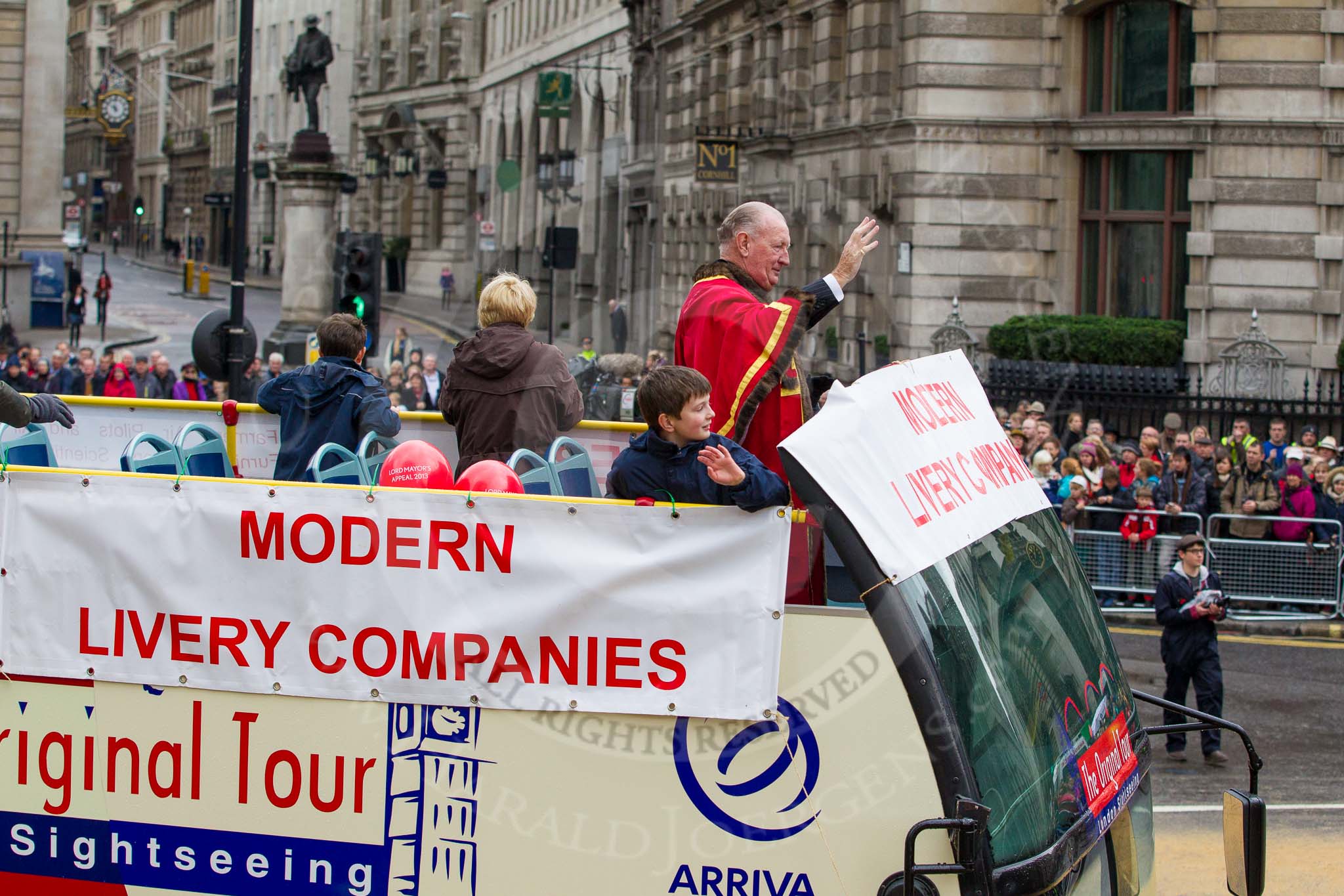 Lord Mayor's Show 2012: Entrry 104 - Modern Livery Companies, representing 26 Livery Companies..
Press stand opposite Mansion House, City of London,
London,
Greater London,
United Kingdom,
on 10 November 2012 at 11:50, image #1405