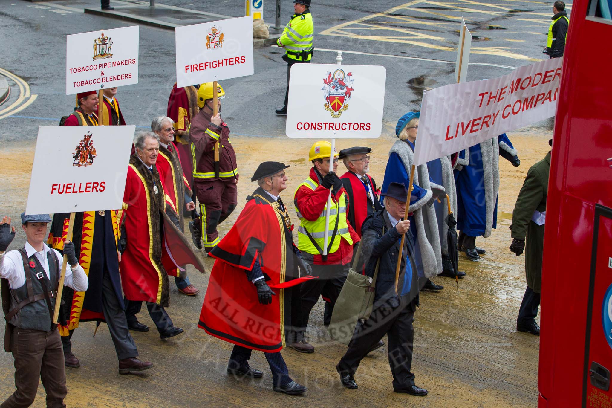 Lord Mayor's Show 2012: Entrry 104 - Modern Livery Companies, representing 26 Livery Companies..
Press stand opposite Mansion House, City of London,
London,
Greater London,
United Kingdom,
on 10 November 2012 at 11:51, image #1410