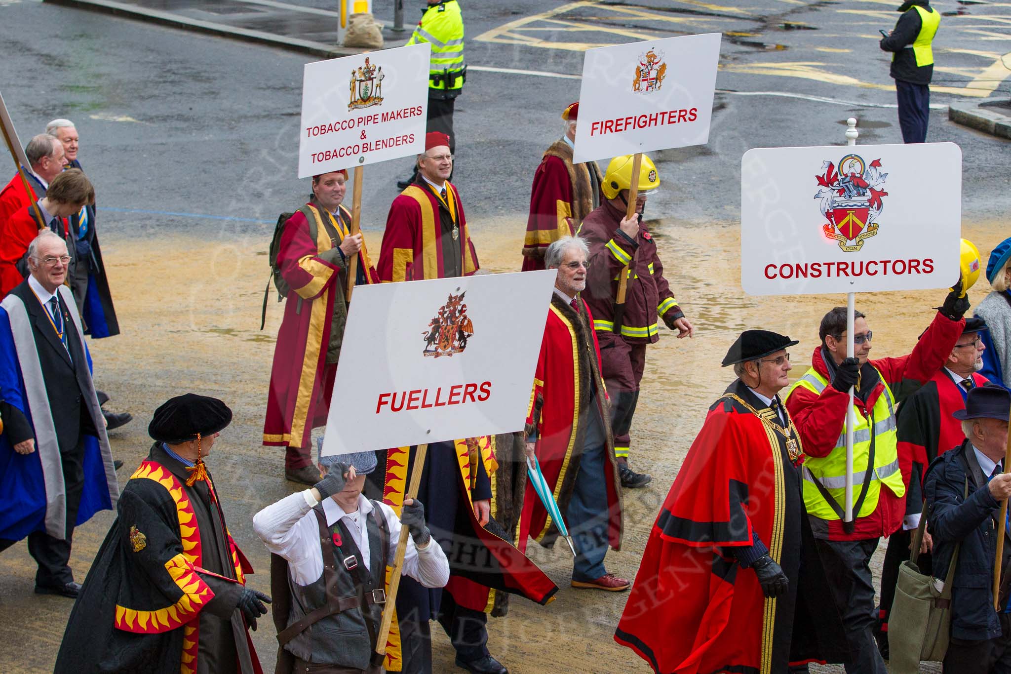 Lord Mayor's Show 2012: Entrry 104 - Modern Livery Companies, representing 26 Livery Companies..
Press stand opposite Mansion House, City of London,
London,
Greater London,
United Kingdom,
on 10 November 2012 at 11:51, image #1412